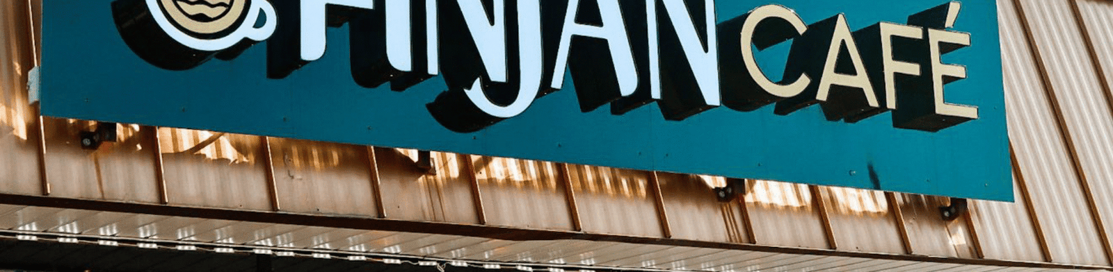 Exterior sign of Finjan Café in Garden City, MI