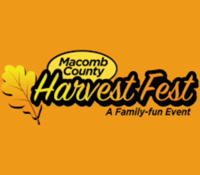 Macomb County Harvest Fest logo featuring a yellow oak leaf and bold black text on an orange background, promoting a family-fun fall event.