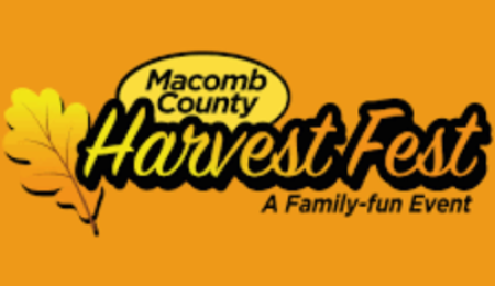 Macomb County Harvest Fest logo featuring a yellow oak leaf and bold black text on an orange background, promoting a family-fun fall event.